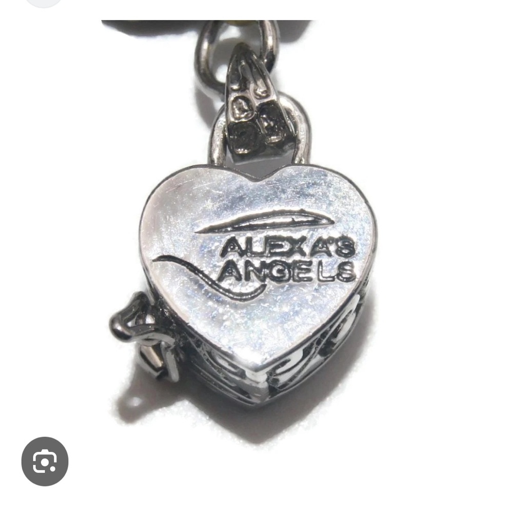 Alexa’s Angels silver tone filigree heart locket charm